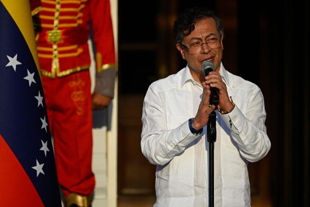 Colombia's President Gustavo Petro speaks after a bilateral meeting at the Miraflores presidential palace in Caracas on April 24, 2026. Colombia's President Gustavo Petro arrived in Venezuela on April 24 for a bilateral meeting with interim President Delcy Rodriguez, focusing on border security and energy cooperation. (Photo by Federico PARRA / AFP)