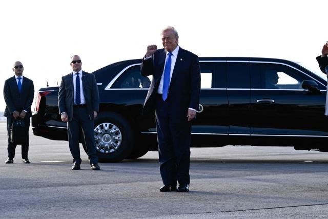 US President Donald Trump steps off Air Force One at Palm Beach International Airport in West Palm Beach, Florida on April 24, 2026. President Trump is heading to Palm Beach, Florida to attend the Republican National Committee (RNC) spring retreat. (Photo by Kent NISHIMURA / AFP)