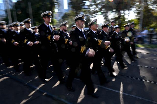 Sailors march to the Shrine of Remembrance during a parade of former and current defence personnel on ANZAC (Australian and New Zealand Army Corps) Day to honour soldiers who have died in the line of duty, in Melbourne on April 25, 2026. (Photo by William WEST / AFP)