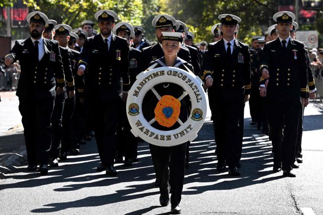 Members of the armed forces participate in the annual ANZAC (Australian and New Zealand Army Corps) Day parade in Sydney on April 25, 2026. Dawn services were held across the two countries on the anniversary of the ill-fated 1915 campaign of the Australian and New Zealand Army Corps that left 11,500 of them dead in what is now Turkey during World War I. (Photo by Saeed KHAN / AFP)