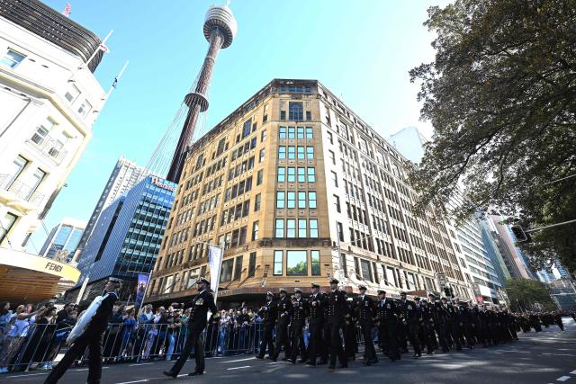 Servicemen and women march during the annual ANZAC (Australian and New Zealand Army Corps) Day parade in Sydney on April 25, 2026. Dawn services were held across the two countries on the anniversary of the ill-fated 1915 campaign of the Australian and New Zealand Army Corps that left 11,500 of them dead in what is now Turkey during World War I. (Photo by Saeed KHAN / AFP)