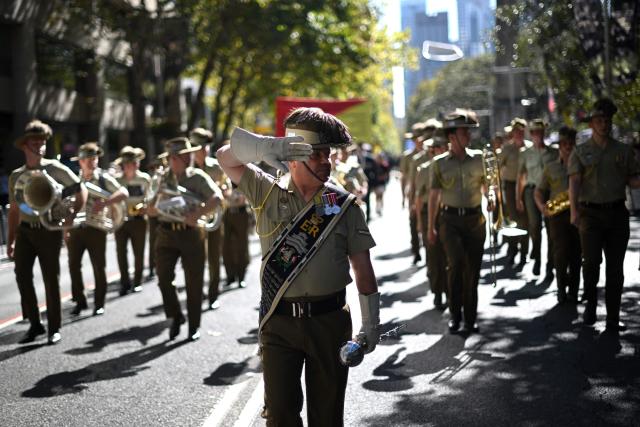 Servicemen and women march during the annual ANZAC (Australian and New Zealand Army Corps) Day parade in Sydney on April 25, 2026. Dawn services were held across the two countries on the anniversary of the ill-fated 1915 campaign of the Australian and New Zealand Army Corps that left 11,500 of them dead in what is now Turkey during World War I. (Photo by Saeed KHAN / AFP)