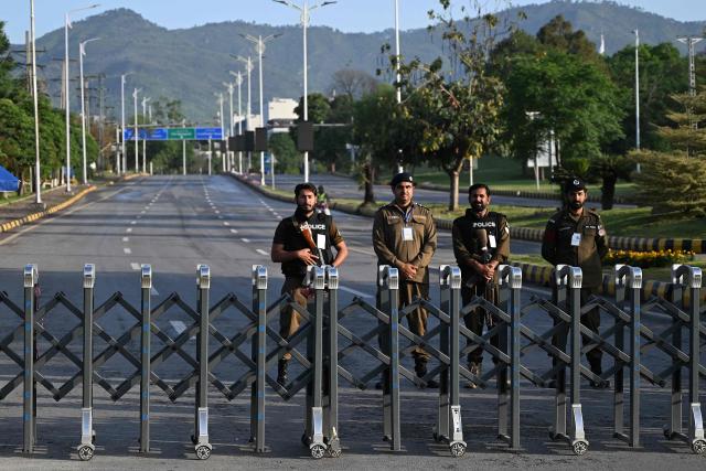 Police officers stand guard near the Serena Hotel, the venue for expected US-Iran talks, in Islamabad’s Red Zone on April 25, 2026. Iran's foreign minister arrived in Islamabad on April 24 and US envoys headed to the Pakistani capital in a bid to kickstart a new round of peace negotiations amid a fragile ceasefire. (Photo by Aamir QURESHI / AFP)
