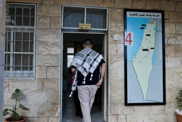 A Palestinian man enters a polling station to cast his vote during municipal elections in the Israeli-occupied West Bank city of Jenin on April 25, 2026. Palestinians in the West Bank and a central area of Gaza began voting on April 25 in municipal elections in a first vote since the Gaza war, marked by a narrow political field and widespread disillusionment. (Photo by Marco Longari / AFP)