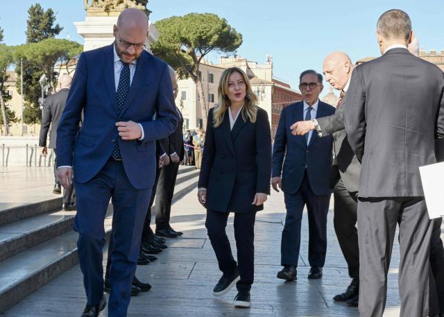 Italy’s prime Minister Giorgia Meloni (C) attends the wreath-laying ceremony at the Altare della Patria of Unknown Soldier on the occasion of the 81st Anniversary of the Liberation, in central Rome, on April 25, 2026. (Photo by Andreas SOLARO / AFP)