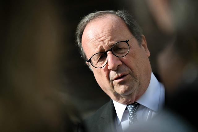 French former President and Socialistes et Apparentes' MP Francois Hollande looks on during a meeting of various figures of the left named "Printemps du souffle breton" in Liffre, western France on April 25, 2026. (Photo by Lou BENOIST / AFP)