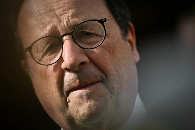 French former President and Socialistes et Apparentes' MP Francois Hollande looks on during a meeting of various figures of the left named "Printemps du souffle breton" in Liffre, western France on April 25, 2026. (Photo by Lou BENOIST / AFP)