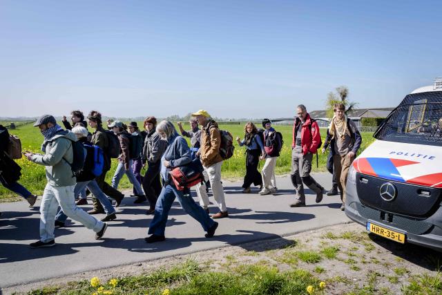 Demonstrators from Extinction Rebellion (XR), Utrecht 4 Palestine (U4P), and Debt for Climate (D4C) take part in a blockade demonstration of the Utrecht ring road in Utrech on April 25, 2026. They demand an immediate end to fossil fuel subsidies and that the money be used for housing, healthcare, decolonial reparations, and debt relief. (Photo by Jeroen JUMELET / ANP / AFP) / Netherlands OUT