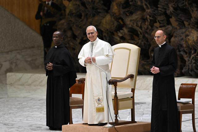 Pope Leo XIV speaks during a private audience with participants in the National Meeting of Catholic Religion Teachers, who teach religion courses in Italian public schools, promoted by the CEI (Catholic Episcopal Conference), at Paul VI Hall in the Vatican on April 25, 2026. (Photo by Andreas SOLARO / AFP)