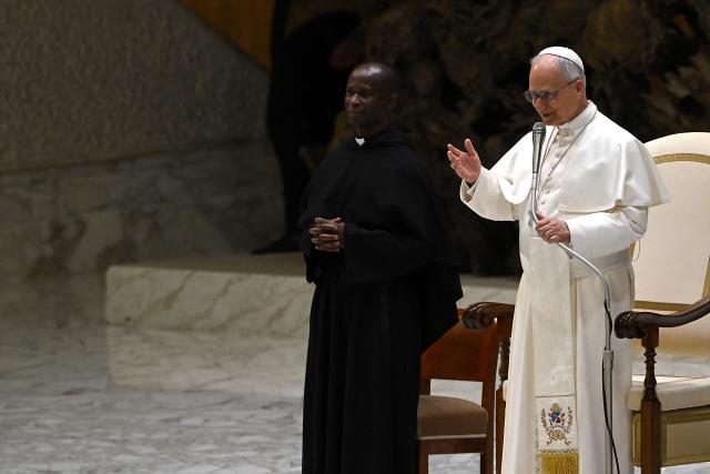 Pope Leo XIV gestures as he speaks during a private audience with participants in the National Meeting of Catholic Religion Teachers, who teach religion courses in Italian public schools, promoted by the CEI (Catholic Episcopal Conference), at Paul VI Hall in the Vatican on April 25, 2026. (Photo by Andreas SOLARO / AFP)
