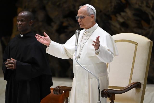 Pope Leo XIV gestures as he speaks during a private audience with participants in the National Meeting of Catholic Religion Teachers, who teach religion courses in Italian public schools, promoted by the CEI (Catholic Episcopal Conference), at Paul VI Hall in the Vatican on April 25, 2026. (Photo by Andreas SOLARO / AFP)