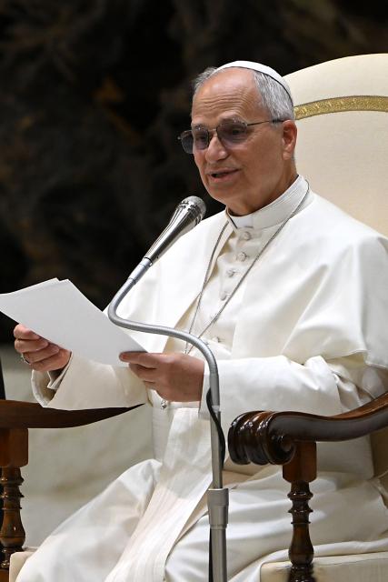 Pope Leo XIV speaks during a private audience with participants in the National Meeting of Catholic Religion Teachers, who teach religion courses in Italian public schools, promoted by the CEI (Catholic Episcopal Conference), at Paul VI Hall in the Vatican on April 25, 2026. (Photo by Andreas SOLARO / AFP)