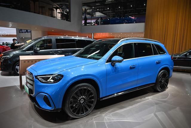 A Mercedes-Benz GLC SUV is displayed at the Beijing Auto Show in Beijing on April 25, 2026. (Photo by GREG BAKER / AFP)