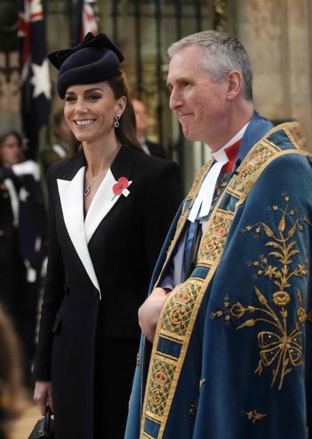 Britain's Catherine, Princess of Wales talks with Canon Rector of Westminster Abbey, Reverend Mark Birch as she attends a Service of Commemoration and Thanksgiving to commemorate ANZAC day, at Westminster Abbey in central London on April 25, 2026. Anzac Day commemorates Australian and New Zealand casualties and veterans of conflicts and marks the anniversary of the landings in the Dardanelles on April 25, 1915 that would signal the start of the Gallipoli Campaign during the First World War. (Photo by Jeff Moore / POOL / AFP)