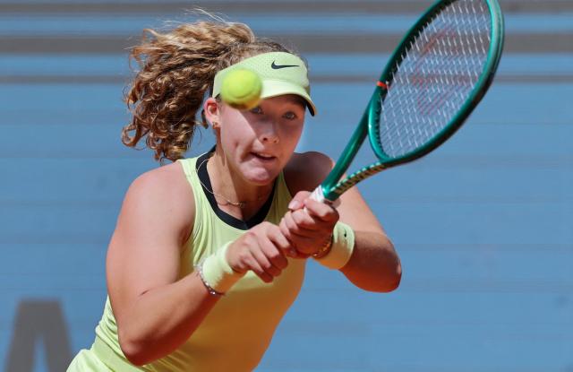 Russia's Mirra Andreeva returns the ball to Hungary's Dalma Galfi during their 2026 WTA Tour Madrid Open tennis tournament third round singles match at the Caja Magica in Madrid, on April 25, 2026. (Photo by Thomas COEX / AFP)