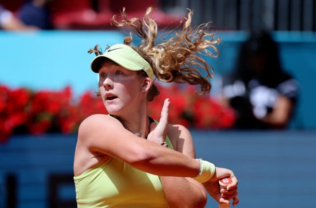 Russia's Mirra Andreeva returns the ball to Hungary's Dalma Galfi during their 2026 WTA Tour Madrid Open tennis tournament third round singles match at the Caja Magica in Madrid, on April 25, 2026. (Photo by Thomas COEX / AFP)