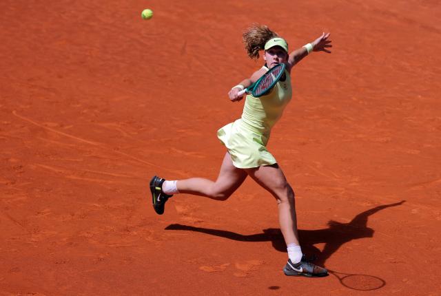 Russia's Mirra Andreeva returns the ball to Hungary's Dalma Galfi during their 2026 WTA Tour Madrid Open tennis tournament third round singles match at the Caja Magica in Madrid, on April 25, 2026. (Photo by Thomas COEX / AFP)