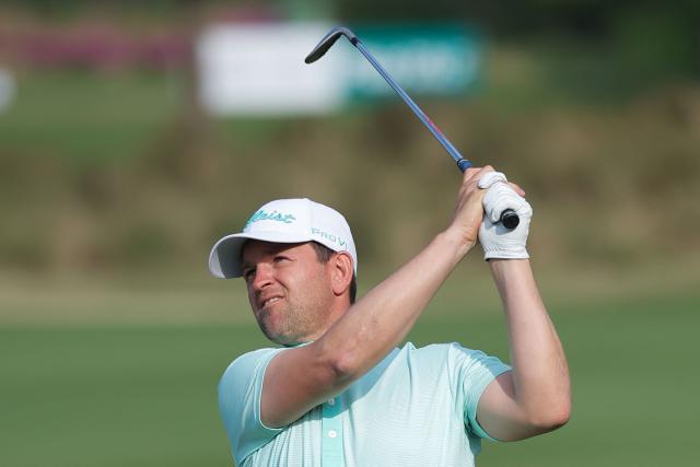 Austria's Bernd Wiesberger hits a shot during the third round of the China Open golf tournament in Shanghai on April 25, 2026. (Photo by CN-STR / AFP) / China OUT