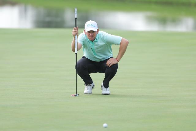 Austria's Bernd Wiesberger prepares to putt during the third round of the China Open golf tournament in Shanghai on April 25, 2026. (Photo by CN-STR / AFP) / China OUT