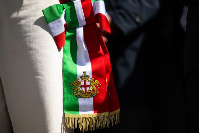 The picture shows the star of the ANPI flag (National Association of Italian Partisans) during the march marking the 81st Liberation Day which commemorates the end of the Nazi-Fascist occupation in Italy during World War II in Genoa on April 25, 2026. (Photo by MARCO BERTORELLO / AFP)