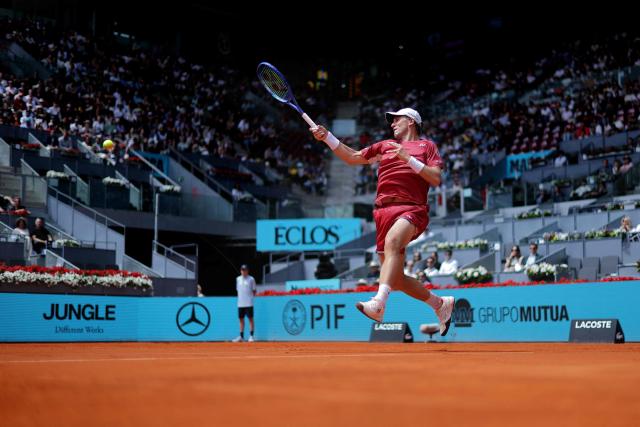 Norway's Casper Ruud returns the ball to Spain's Jaume Munar during their 2026 ATP Tour Madrid Open tennis tournament third round singles match at the Caja Magica in Madrid, on April 25, 2026. (Photo by Thomas COEX / AFP)