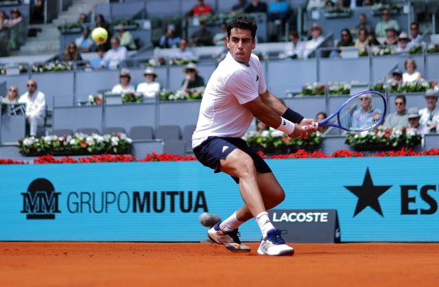 Spain's Jaume Munar returns the ball to Norways Casper Ruud during their 2026 ATP Tour Madrid Open tennis tournament third round singles match at the Caja Magica in Madrid, on April 25, 2026. (Photo by Thomas COEX / AFP)