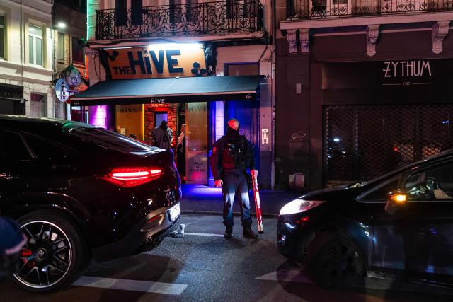 French National Police officers stop a car during a roadside night check for nitrous oxide canisters in Lille, northern France, on April 25, 2026. (Photo by Sameer Al-DOUMY / AFP)