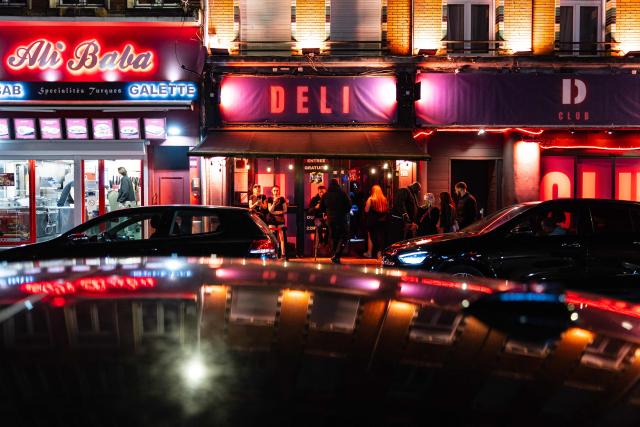 Youth stand in front of a nightclub in Lille, northern France, on April 25, 2026. (Photo by Sameer Al-DOUMY / AFP)