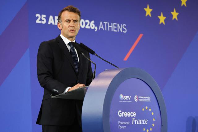 France's President Emmanuel Macron delivers a speech during a Franco-Greek Economic Forum at the Stavros Niarchos foundation in Athens, on April 25, 2026. The two leaders signed a text titled “Enhanced Comprehensive Strategic Partnership between Greece and France” and signed the renewal of the Strategic Relationship Agreement for cooperation in security and defense. (Photo by Ludovic MARIN / AFP)