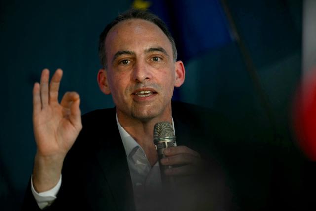 French politician Raphael Glucksmann gestures as he speaks during a meeting of various figures of the left named "Printemps du souffle breton" in Liffre, western France, on April 25, 2026. (Photo by LOU BENOIST / AFP)
