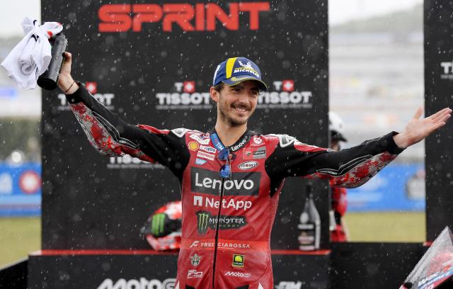 Second placed Team Ducati Lenovo Team's Francesco Bagnaia celebrates on the podium after the MotoGP Spanish Grand Prix sprint race at the Jerez racetrack in Jerez de la Frontera, on April 25, 2026. (Photo by JORGE GUERRERO / AFP)