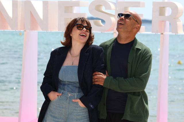 French actor Eric Judor (R) and french actress Sophie Marie Larrouy poses during the "A bientot te revoir" photocall as part of the 9th edition of the Cannes international Series Festival (Canneseries) in Cannes, southern France, on April 25, 2026. (Photo by Valery HACHE / AFP)