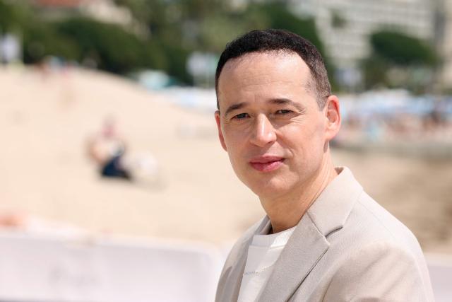 French acIsraeli-US screenwriter Ron Leshem poses during the 9th edition of the Cannes international Series Festival (Canneseries) in Cannes, southern France, on April 25, 2026. (Photo by Valery HACHE / AFP)