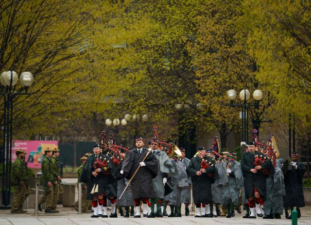 Soldiers and veterans of the 48th Highlanders of Canada march in the annual Freedom of the City Parade in Toronto, on April 25, 2026. The 48th Highlanders of Canada is an active Canadian Forces Primary Reserve infantry regiment formed in 1891 that fought in both World Wars. Freedom of the City is a prestigious honour granted to military units with long-standing ties to a municipality. Rooted in a 15th-century English tradition, the ceremony remains significant in the Canadian Army today. This year also marks the 135th anniversary of the 48th Highlanders. (Photo by Peter POWER / AFP)