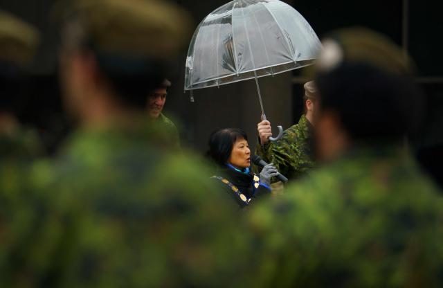 Toronto Mayor Olivia Chow addresses the troops during the 48th Highlanders of Canada Freedom of the City parade and ceremony in Toronto, on April 25, 2026. The 48th Highlanders of Canada is an active Canadian Forces Primary Reserve infantry regiment formed in 1891 that fought in both World Wars. Freedom of the City is a prestigious honour granted to military units with long-standing ties to a municipality. Rooted in a 15th-century English tradition, the ceremony remains significant in the Canadian Army today. This year also marks the 135th anniversary of the 48th Highlanders. (Photo by Peter POWER / AFP)