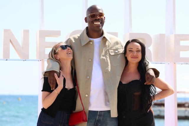 (From L) Actors Audrey Lamy, Jean-Pascal Zadi, Eva Huault pose during the "Surveillant" photocall as part of the  9th edition of the Cannes international Series Festival (Canneseries) in Cannes, southern France, on April 25, 2026. (Photo by Valery HACHE / AFP)