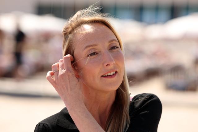 French actress Audrey Lamy poses during the "Surveillant" photocall as part of the 9th edition of the Cannes international Series Festival (Canneseries) in Cannes, southern France, on April 25, 2026. (Photo by Valery HACHE / AFP)
