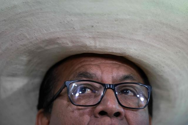 Peruvian presidential candidate for the Juntos por el Peru party, Roberto Sanchez, speaks during a press conference at the party's headquarters in Lima on April 25, 2026. (Photo by Connie FRANCE / AFP)