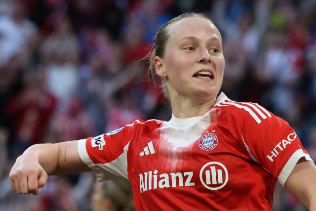 Bayern Munich's German forward #20 Franziska Kett celebrates scoring the 1-1 goal during the UEFA Women's Champions League semi-final first leg football match between FC Bayern Munich and FC Barcelona in Munich, southern Germany on April 25, 2026. (Photo by Karl-Josef HILDENBRAND / AFP)