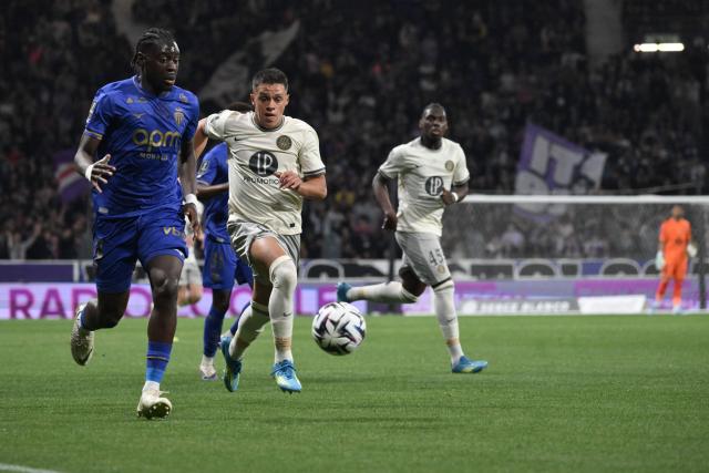 Monaco's French defender #13 Christian Mawissa (L) and Toulouse's Argentine forward #11 Santiago Hidalgo (2L) chase the ball during the French L1 football match between Toulouse FC and AS Monaco at the TFC Stadium in Toulouse, southwestern France, on April 25, 2026. (Photo by Ed JONES / AFP)
