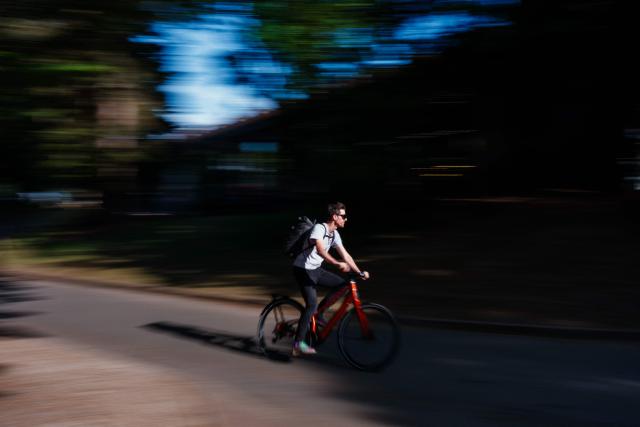 A man tests a new bicycle during the Velo in Paris festival at the Parc Floral de Vincennes, in Vincennes, eastern Paris, on April 25, 2025. (Photo by Dimitar DILKOFF / AFP)
