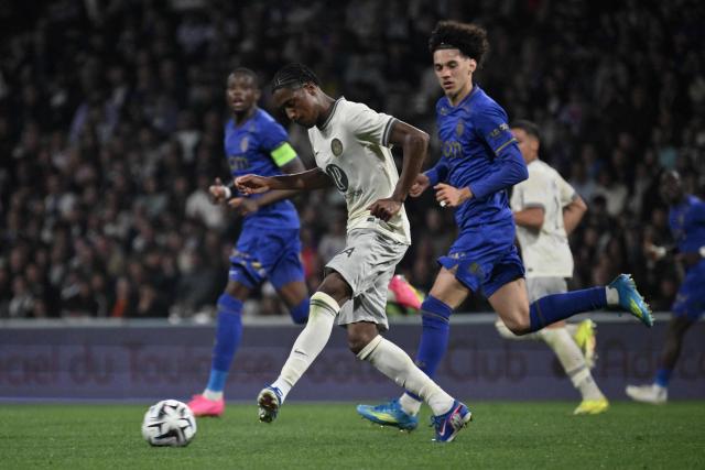Toulouse's Senegalese midfielder #18 Pape Demba Diop (C) passes the ball in front of Monaco's French midfielder #11 Maghnes Akliouche (R) during the French L1 football match between Toulouse FC and AS Monaco at the TFC Stadium in Toulouse, southwestern France, on April 25, 2026. (Photo by Ed JONES / AFP)