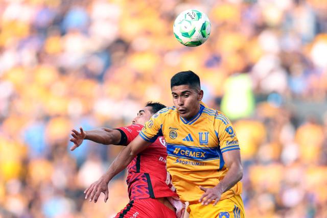 Mazatlan's midfielder #25 Said Godinez (L) and Tigres' midfielder #02 Francisco Reyes fight for the ball during the Liga MX Clausura football match between Tigres and Mazatlan at Universitario de la UANL Stadium in Monterrey, Nuevo Leon state, Mexico, on April 25, 2026. (Photo by Julio Cesar AGUILAR / AFP)