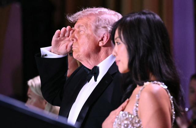 US President Donald Trump and CBS News senior White House correspondent Weijia Jiang attend the White House Correspondents' dinner at the Washington Hilton in Washington, DC, on April 25, 2026. President Trump is attending the annual gala of the political press for the first time while in office. (Photo by Mandel NGAN / AFP)