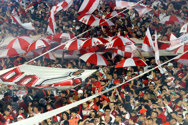 River Plate fans cheer for their team ahead of the Argentine Professional Football League 2026 Apertura Tournament match between River Plate and Aldosivi at Monumental Stadium in Buenos Aires on April 25, 2026. (Photo by ALEJANDRO PAGNI / AFP)