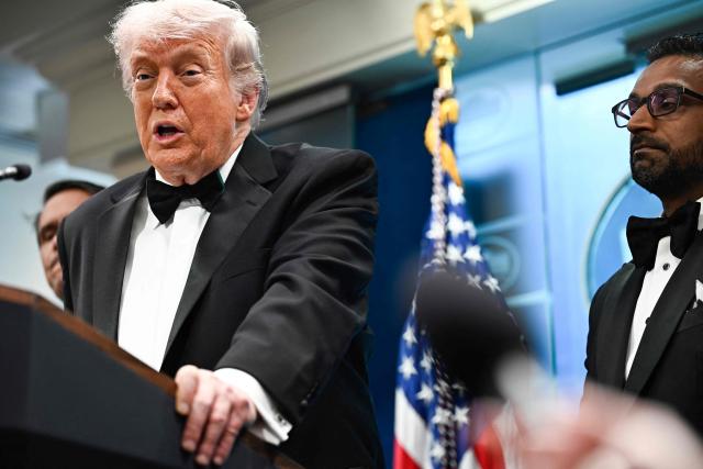 US President Donald Trump speaks, flanked by FBI Director Kash Patel, during a press briefing in the Brady Briefing Room at the White House in Washington, DC, shortly after a shooting incident at the White House Correspondents Dinner on April 25, 2026. US President Donald Trump said April 25 he would give a press conference from the White House press briefing room, shortly after a shooting incident at a gala dinner in Washington. The press conference is set to take place shortly after 10 p.m. (0200 GMT), Trump wrote on his Truth Social platform, adding: "The First Lady, plus the Vice President, and all Cabinet members, are in perfect condition." (Photo by Kent NISHIMURA / AFP)