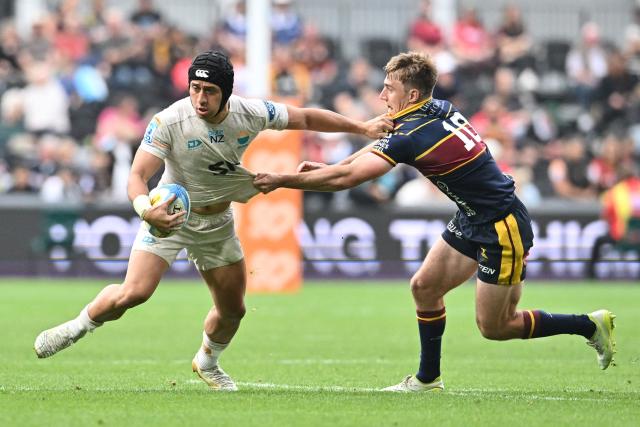 Moana Pasifika's Glen Vaihu (L) is tackled by Highlanders' Cameron Millar during the Super Rugby Pacific match between the Highlanders and Moana Pasifika at One New Zealand Stadium in Christchurch on April 26, 2026. (Photo by Sanka VIDANAGAMA / AFP)