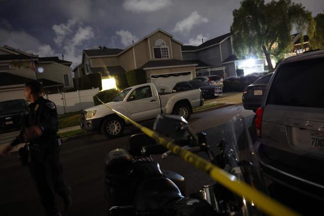 Torrance police department officers move members of the media back after FBI agents arrived at the home of the alleged White House Correspondents Dinner shooter in Torrance, California, on April 25, 2026. US President Donald Trump said April 25 he would give a press conference from the White House press briefing room, shortly after a shooting incident at a gala dinner in Washington. The press conference is set to take place shortly after 10 p.m. (0200 GMT), Trump wrote on his Truth Social platform, adding: "The First Lady, plus the Vice President, and all Cabinet members, are in perfect condition." (Photo by Patrick T. Fallon / AFP)