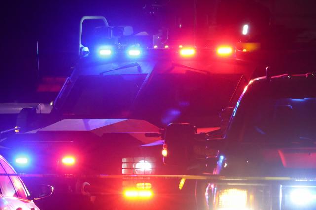 An FBI tactical team arrives in armored vehicles outside a house associated with the suspected White House Correspondents Dinner shooter as in Torrance, California, on April 25, 2026. US President Donald Trump said April 25 he would give a press conference from the White House press briefing room, shortly after a shooting incident at a gala dinner in Washington. The press conference is set to take place shortly after 10 p.m. (0200 GMT), Trump wrote on his Truth Social platform, adding: "The First Lady, plus the Vice President, and all Cabinet members, are in perfect condition." (Photo by Patrick T. Fallon / AFP)