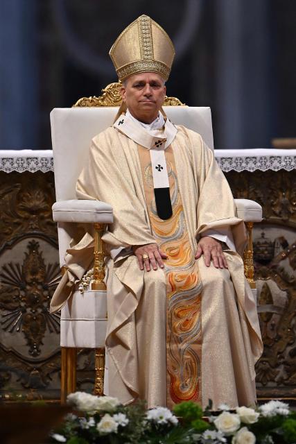 Pope Leo XIV (C) presides over the Holy Mass with Priestly Ordinations, at St Peter's Basilica in the Vatican on April 26, 2026. (Photo by Andreas SOLARO / AFP)